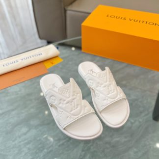 Louis Vuitton embossed grained leather slippers