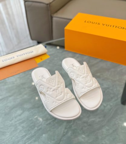 Louis Vuitton embossed grained leather slippers