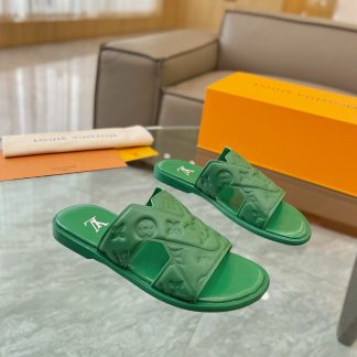 Louis Vuitton embossed grained leather slippers