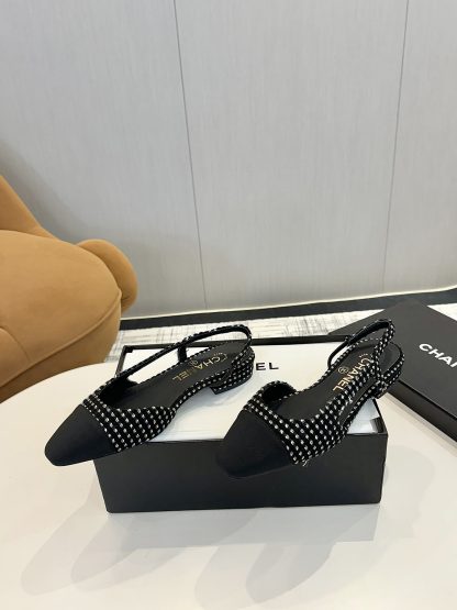 Chanel's latest black and white mix and match color all-match luxury ballet flat sandals