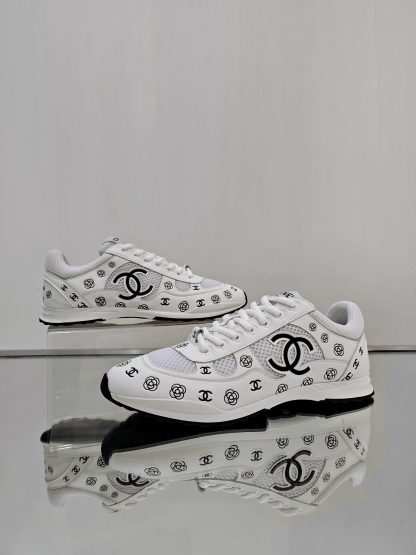 Chanel unisex white and black diamond-patterned breathable mesh casual shoes