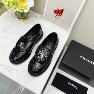 Chanel's early spring black shiny new temperament loafers
