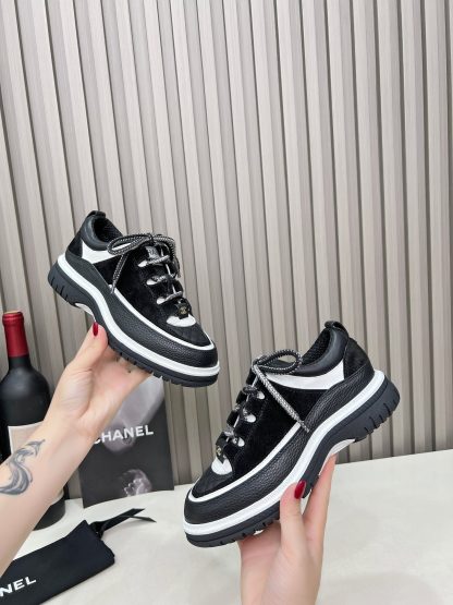 Chanel's new early spring casual black classic embroidery style casual sports shoes