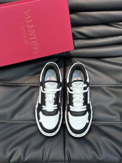 VALENTINO low-top sneakers in calfskin with rivets