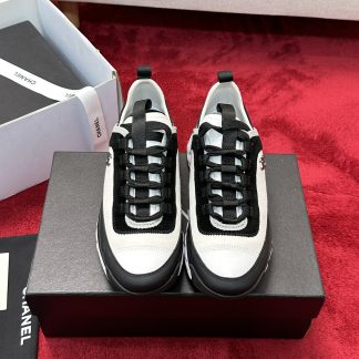 Chanel men's and women's couple's black and white mix and match classic casual sneakers