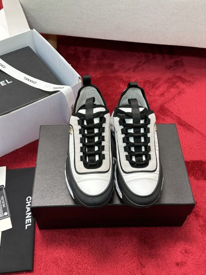 Chanel men's and women's couple's versatile fashion black and white mix and match casual sports shoes
