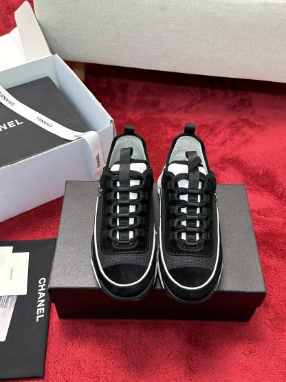 Chanel men's and women's couple's black and white mix and match classic fashion casual sports shoes