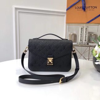 Louis Vuitton Métis Clutch