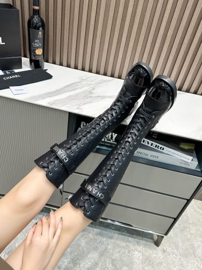 Chanel girly black leather mid boots