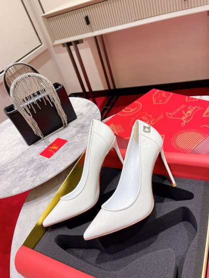 Christian Louboutin patent leather CL buckle high heels