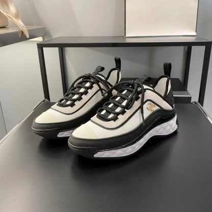 Chanel's latest beautiful black and white slim casual sneakers