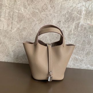 Hermès Trench Coat Grey Basket Handbag Gold and Silver Buckle