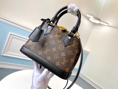 Louis Vuitton m53152 black leather iconic handbag