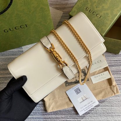 Gucci small elegant gold chain bag