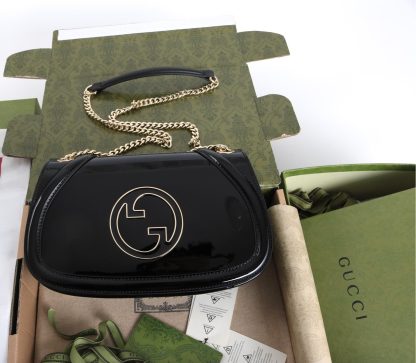 Gucci shiny black patent leather handbag