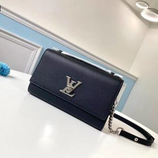 Louis Vuitton LOCKME CLUTCH handbag