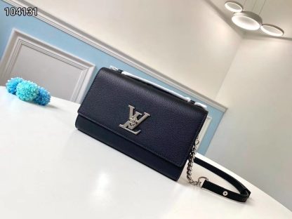 Louis Vuitton LOCKME CLUTCH handbag