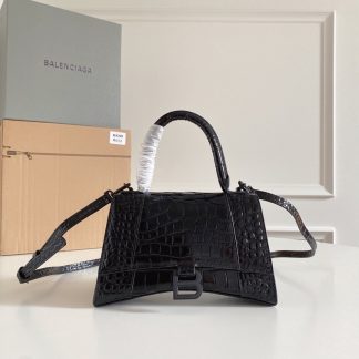 Balenciaga black bag with crocodile pattern
