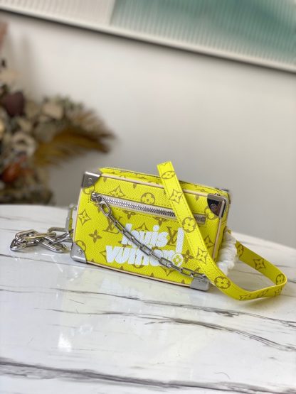 Louis Vuitton yellow flower white font silk screen chain small box bag