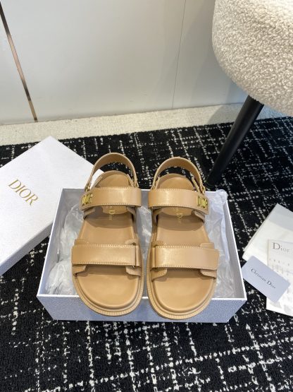 Dior studded flat sandals with a single strap