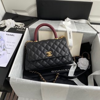 Chanel classic diamond quilted handbag with snake skin handle
