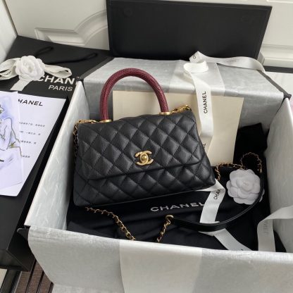 Chanel classic diamond quilted handbag with snake skin handle