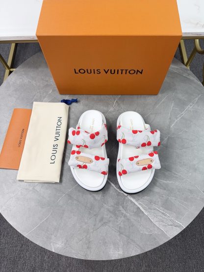 Louis Vuitton embossed logo slippers Pool Pillow Comfort flat slides
