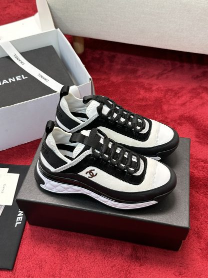 Chanel men's and women's couple's black and white mix and match classic casual sneakers - Image 2