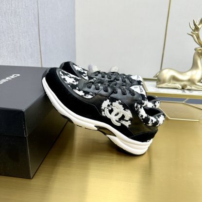 Chanel classic fashion black and white casual sneakers - Image 2