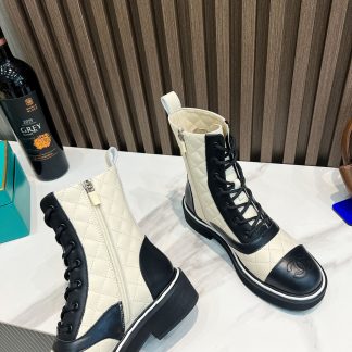 Chanel's latest boots from the Paris catwalk in beige and black