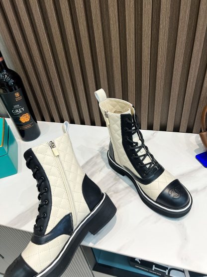 Chanel's latest boots from the Paris catwalk in beige and black