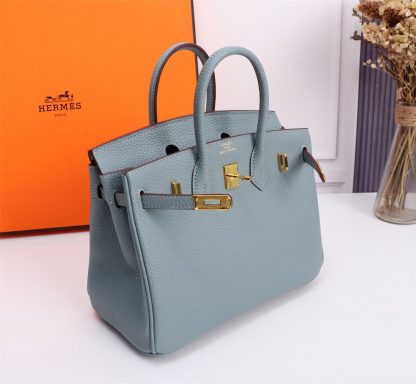 Hermès blue handbag, a must-have for elegance - Image 2