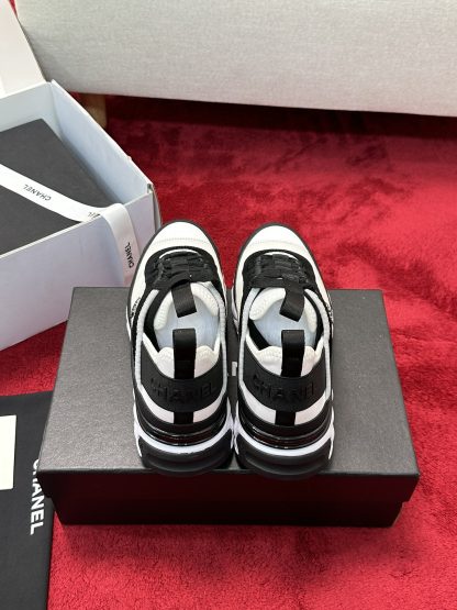 Chanel men's and women's couple's black and white mix and match classic casual sneakers - Image 3