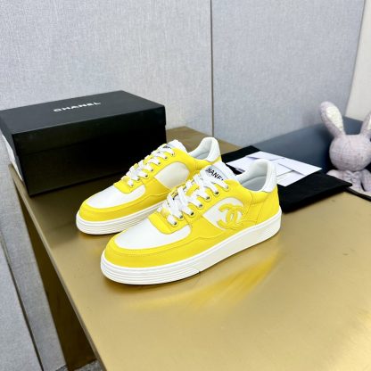 Chanel classic yellow and white mix and match fashion casual sneakers - Image 3