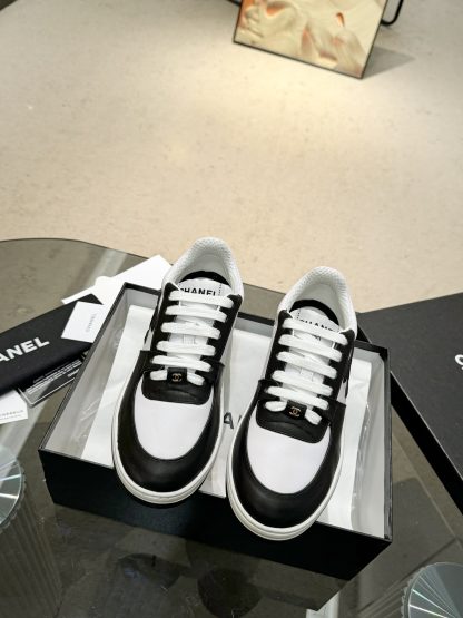 Chanel classic design black and white casual sneakers