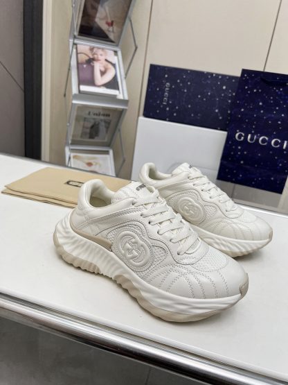 Chanel White Leather and Knitted Casual Sneakers - Image 3