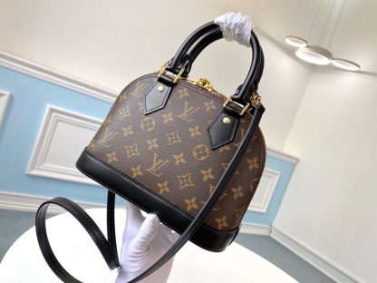 Louis Vuitton m53152 black leather iconic handbag - Image 3