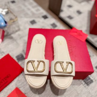 VALENTINO exquisite minimalist white slippers