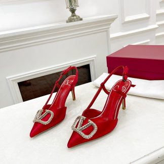 VALENTINO elegant high heels with rhinestone buckle