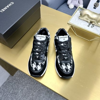 Chanel classic fashion black and white casual sneakers - Image 4