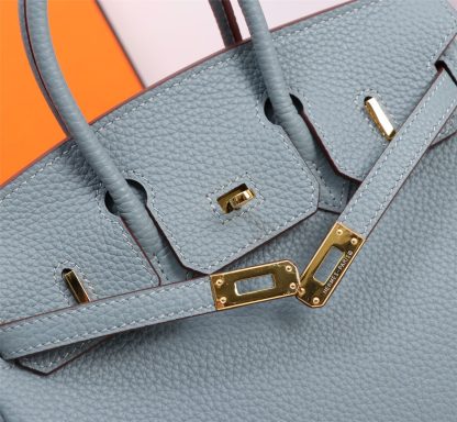Hermès blue handbag, a must-have for elegance - Image 4