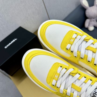 Chanel classic yellow and white mix and match fashion casual sneakers - Image 4