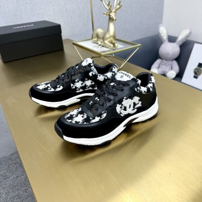 Chanel classic fashion black and white casual sneakers - Image 5