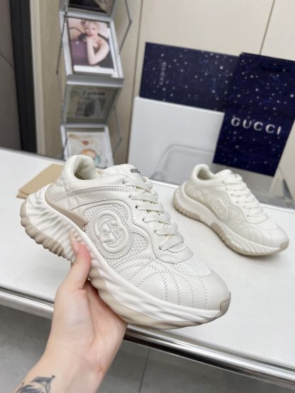 Chanel White Leather and Knitted Casual Sneakers - Image 4