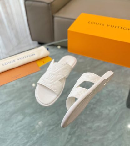 Louis Vuitton embossed grained leather slippers - Image 6