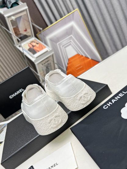 Chanel classic ultimate luxury white sneakers - Image 5