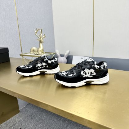 Chanel classic fashion black and white casual sneakers - Image 6