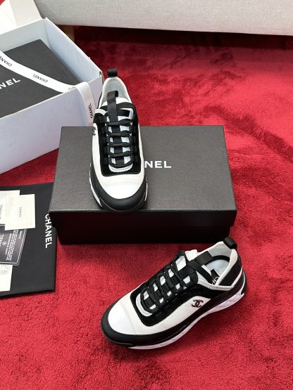 Chanel men's and women's couple's black and white mix and match classic casual sneakers - Image 6