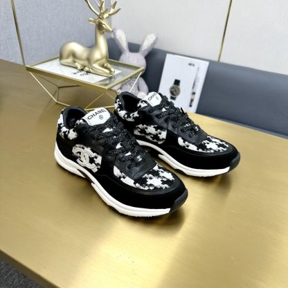 Chanel classic fashion black and white casual sneakers - Image 7