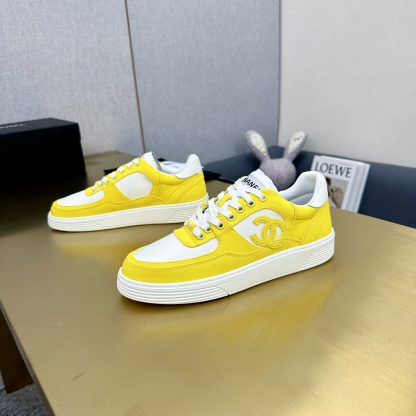 Chanel classic yellow and white mix and match fashion casual sneakers - Image 7